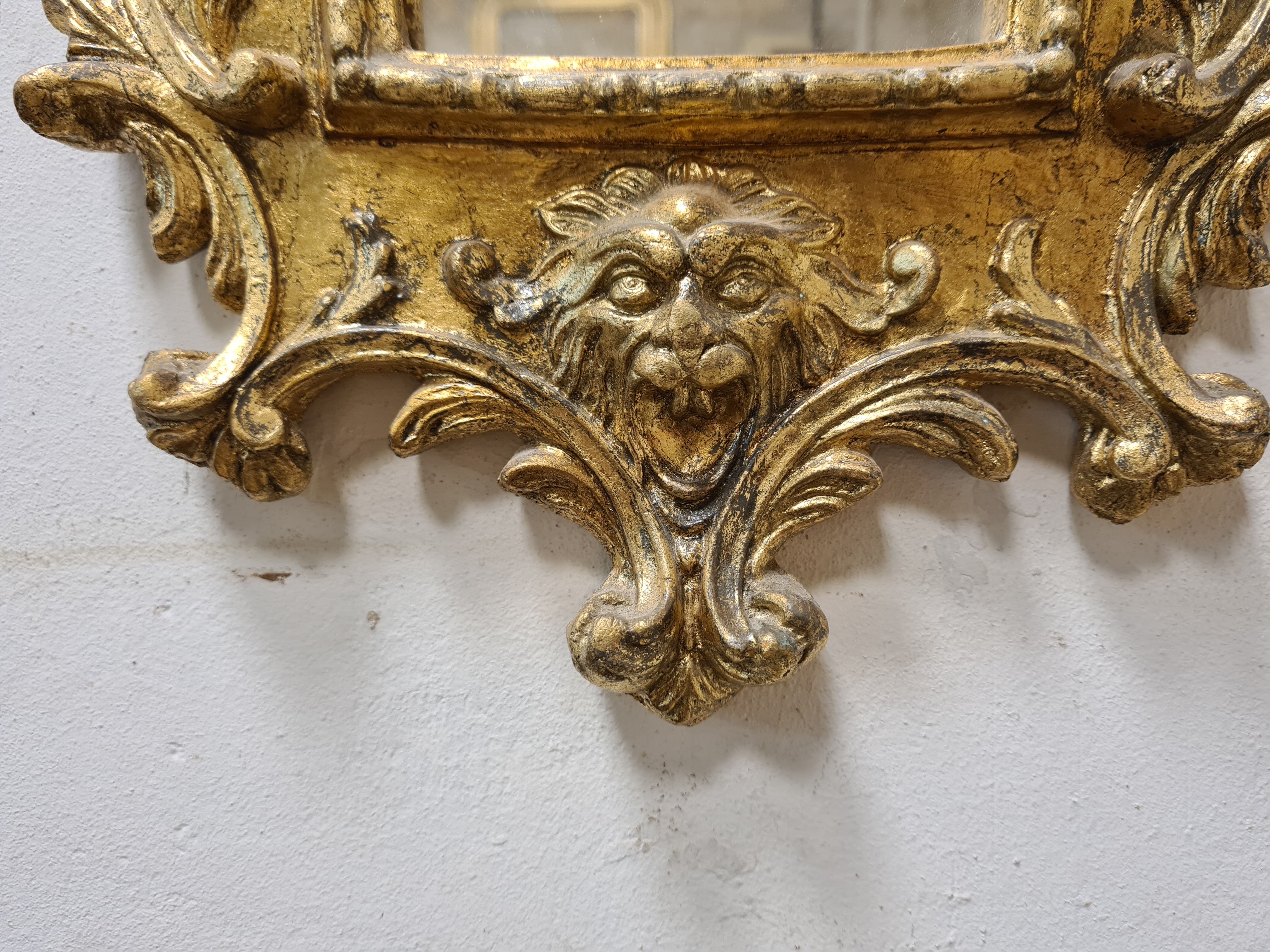 Mirror in gilded plaster with leaf 61x32