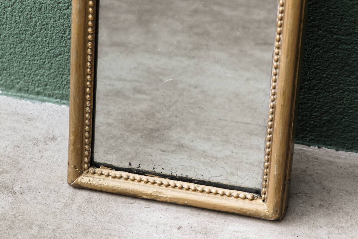 Mercury mirror, carved wood