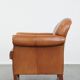 Fauteuil en cuir de vachette couleur cognac