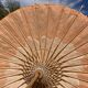 Powder pink paper umbrella and wooden handle