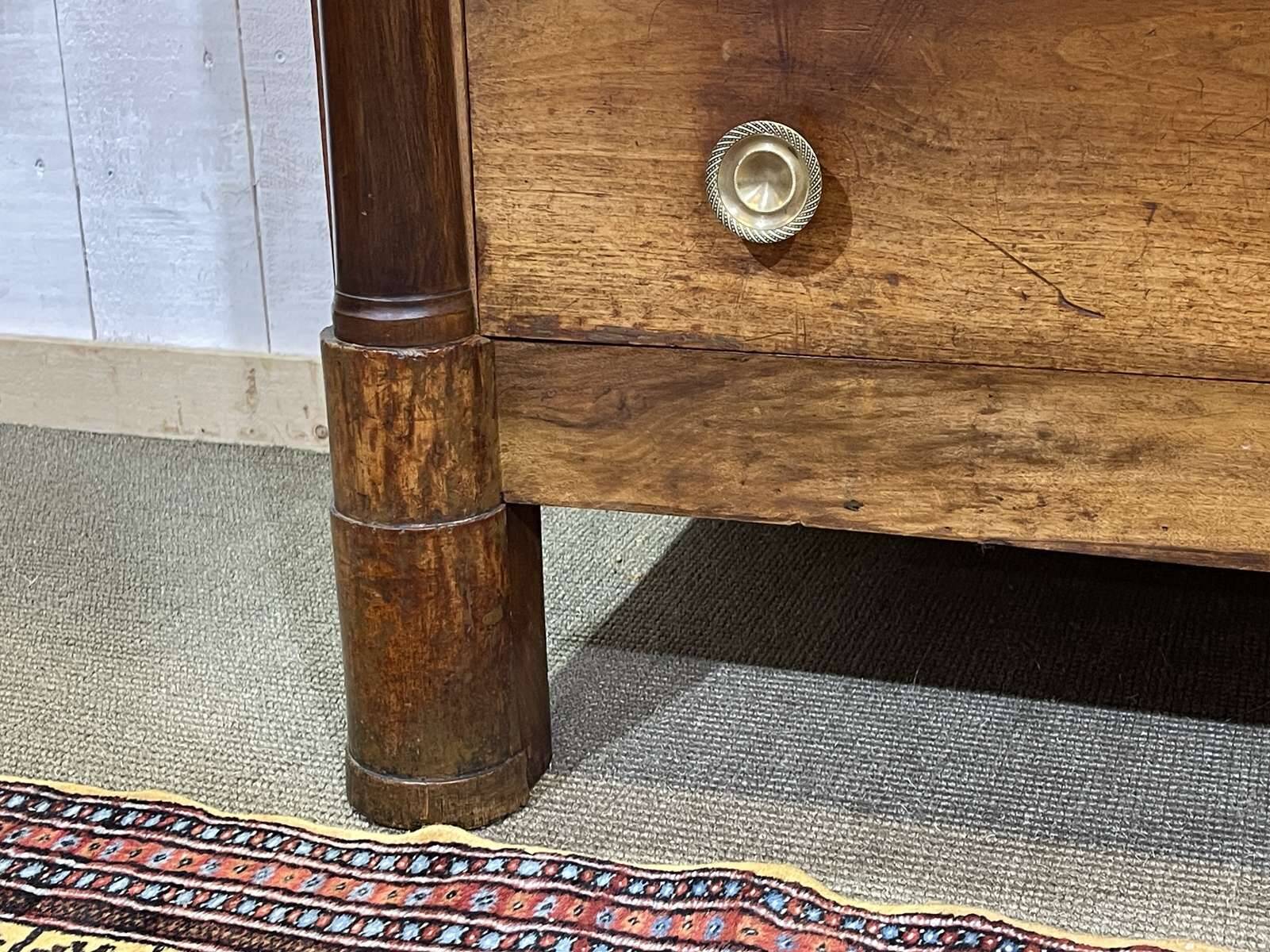 19th-century Empire commode in walnut with a grey St Anne marble top.