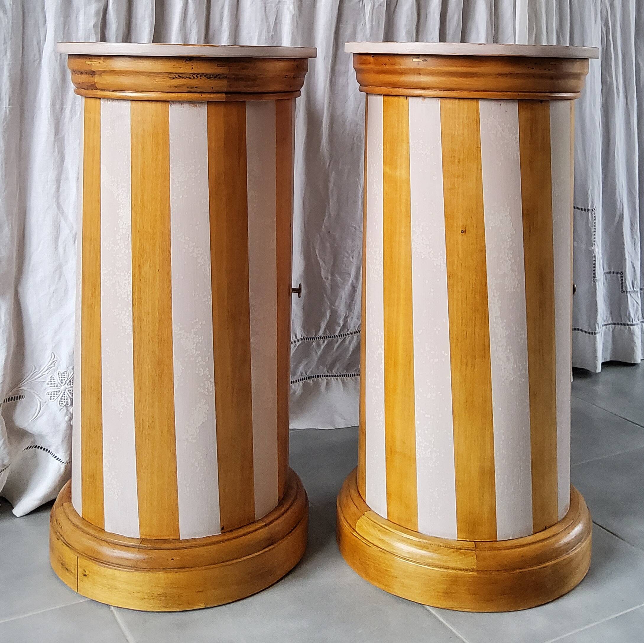 A pair of distressed bedside tables.
