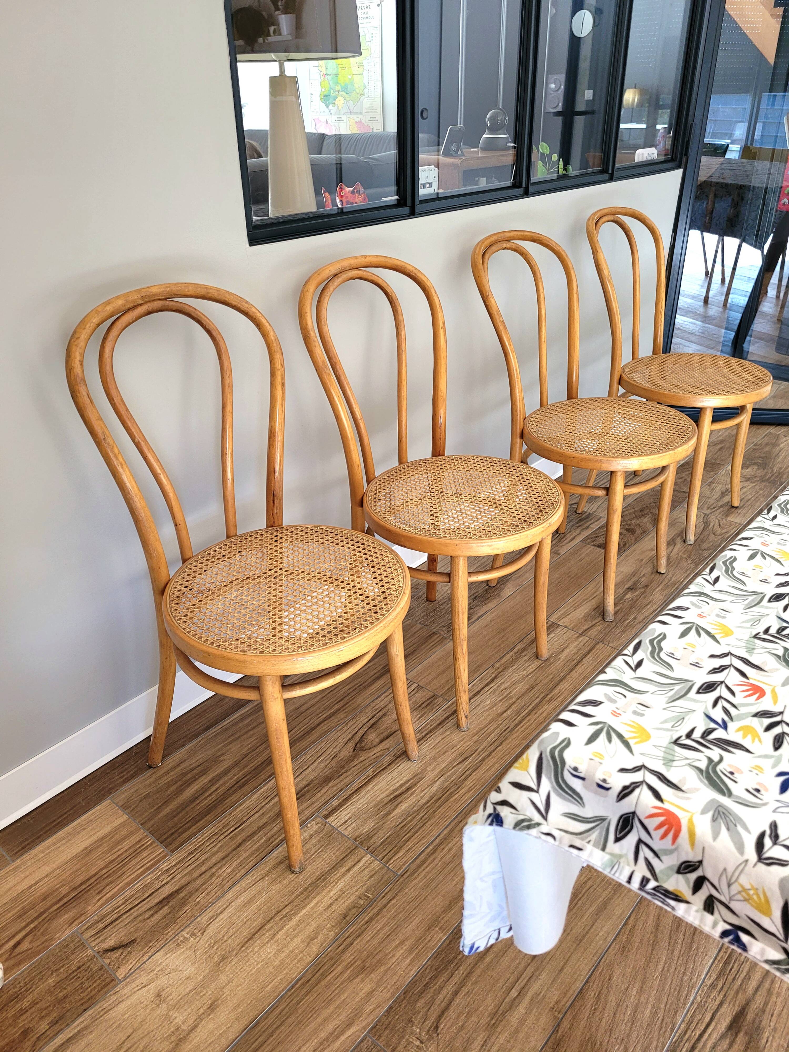 Four cane bistro chairs