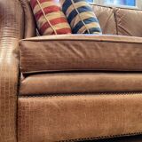 Brown braided leather sofa