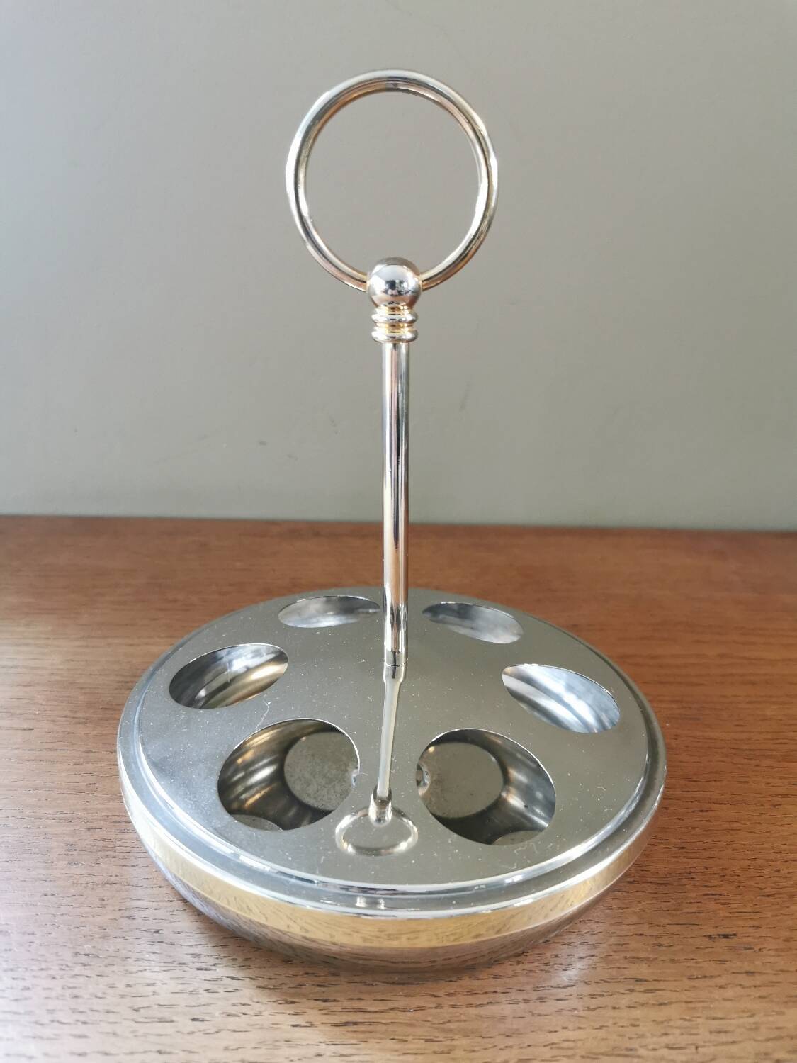 6 shot glasses on vintage metal support