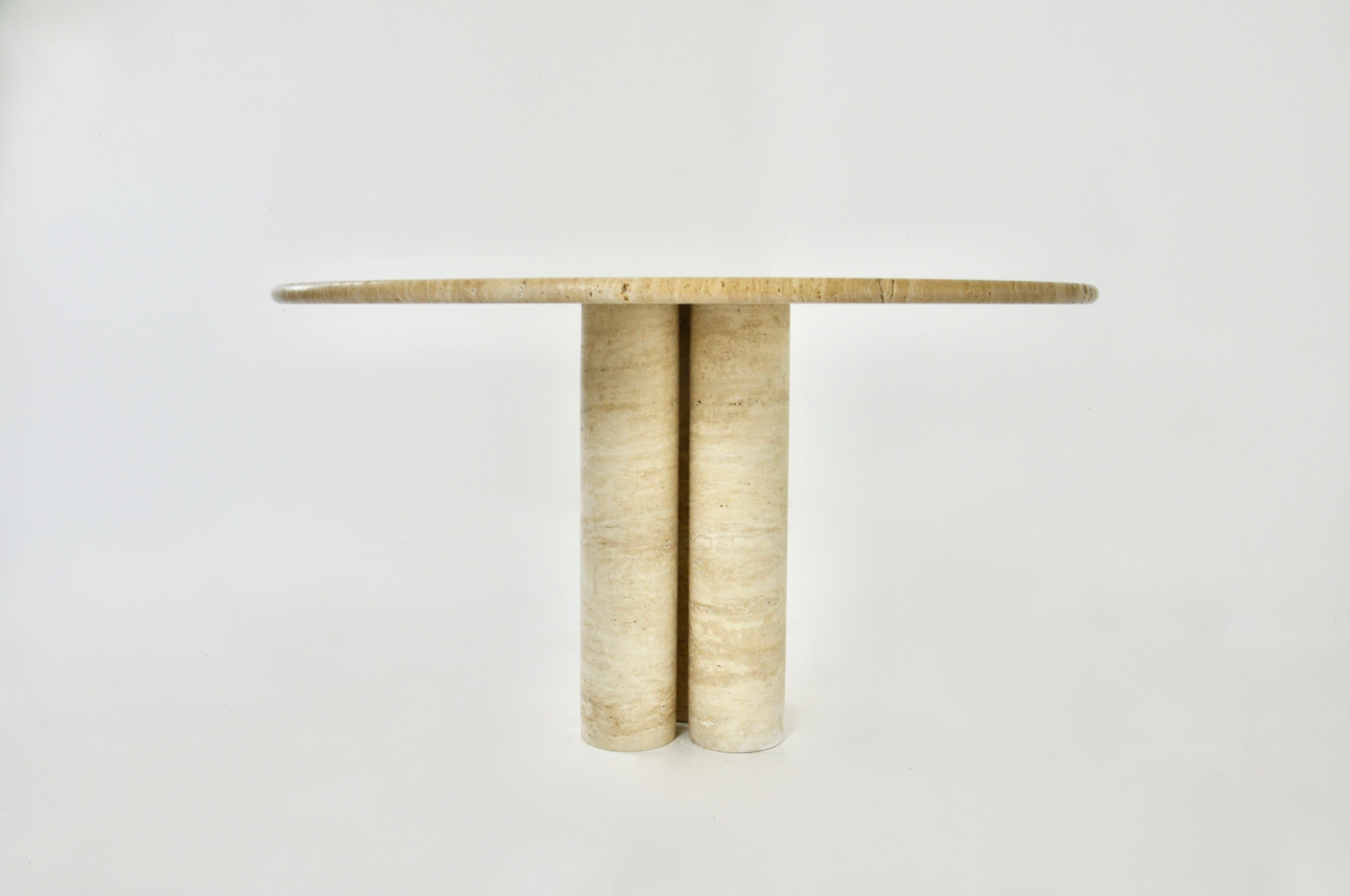 Circular travertine dining table