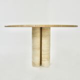 Circular travertine dining table