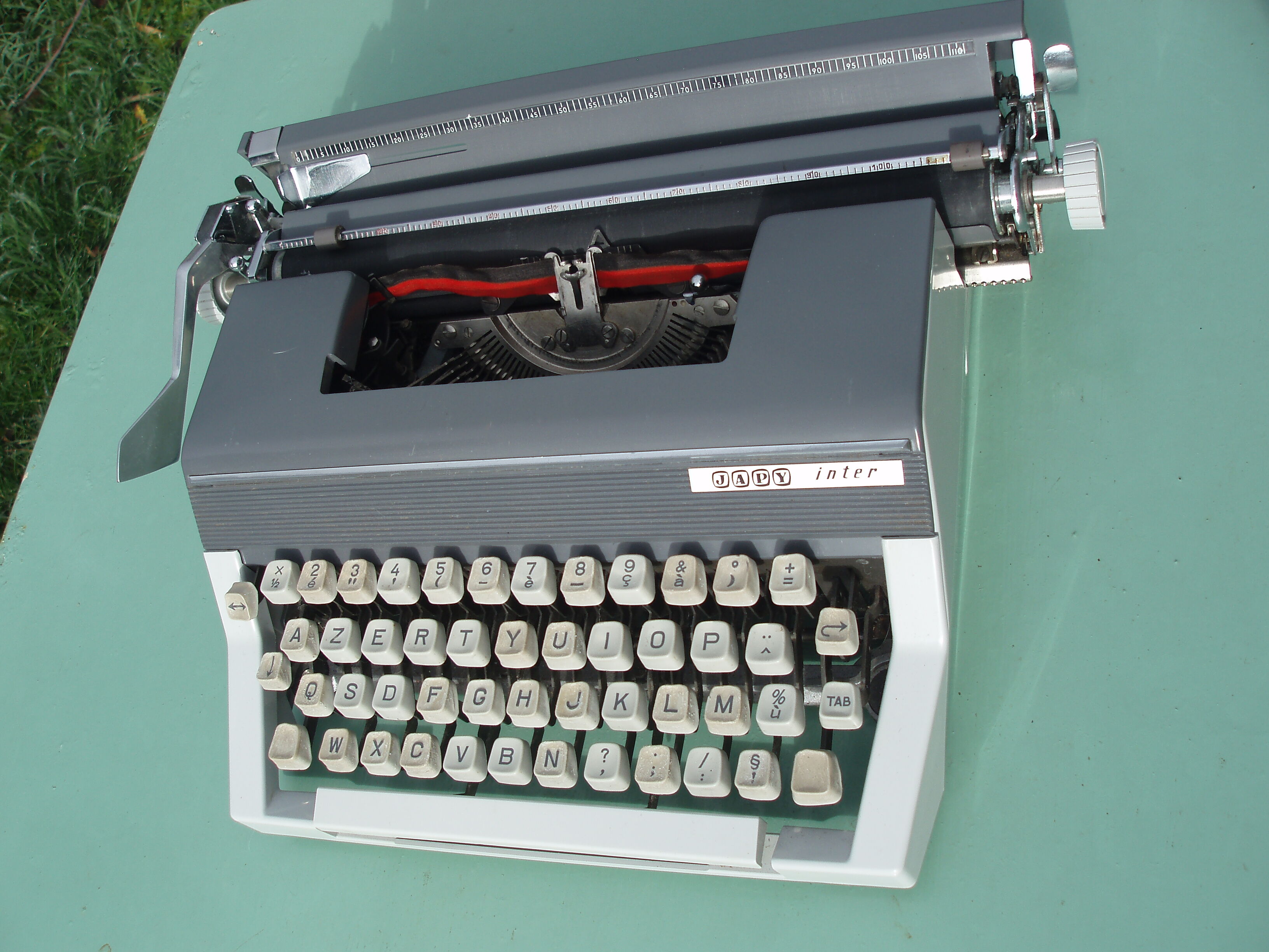 Typewriter in very good condition revised japy inter with his satchel
