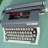 Typewriter in very good condition revised japy inter with his satchel