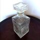 Pair of vintage diamond-cut whiskey decanters