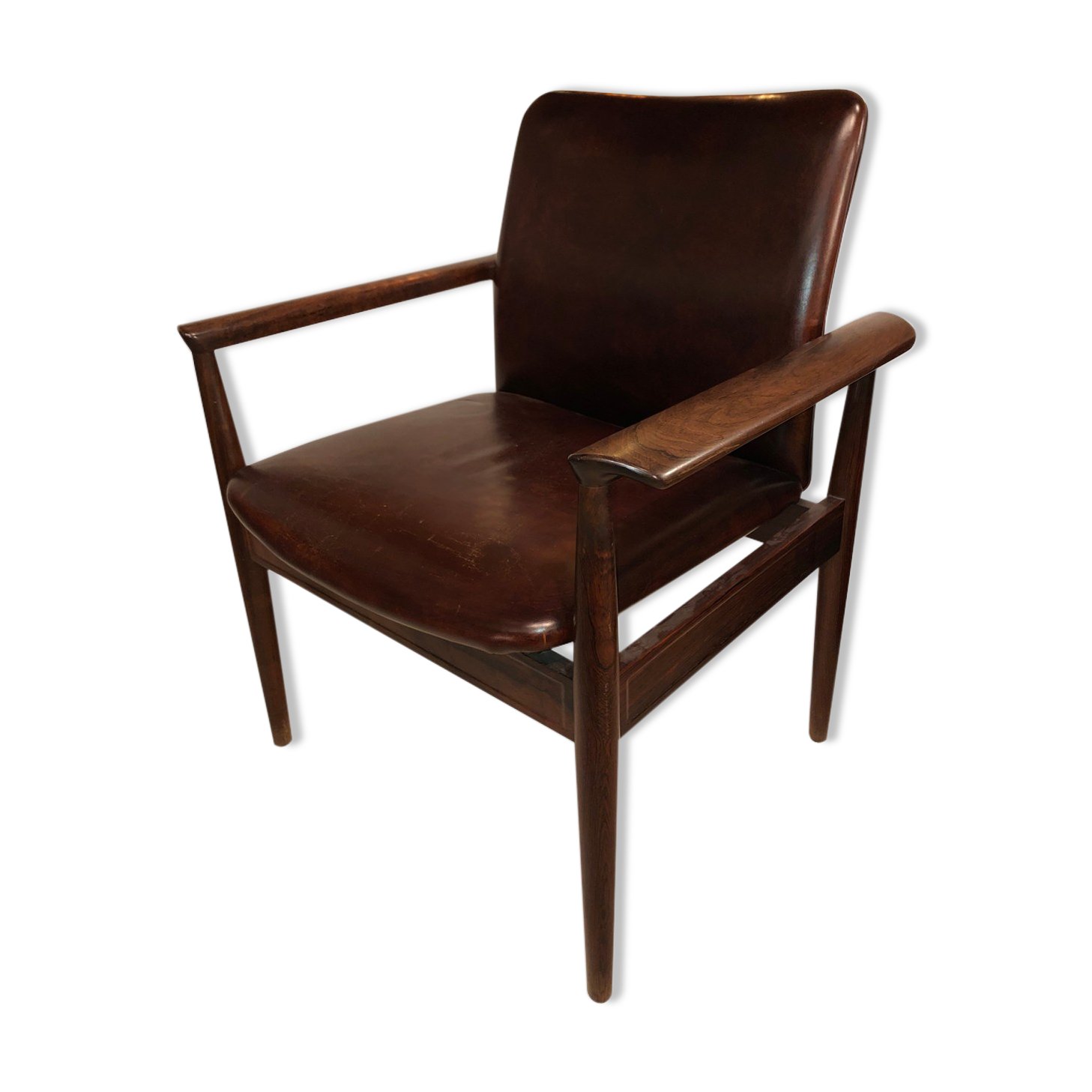 Finn Juhl's "Diplomat" armchair from the 1960s in solid rosewood and leather