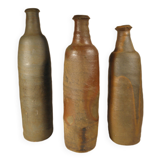 Trois bouteilles anciennes en gres normand