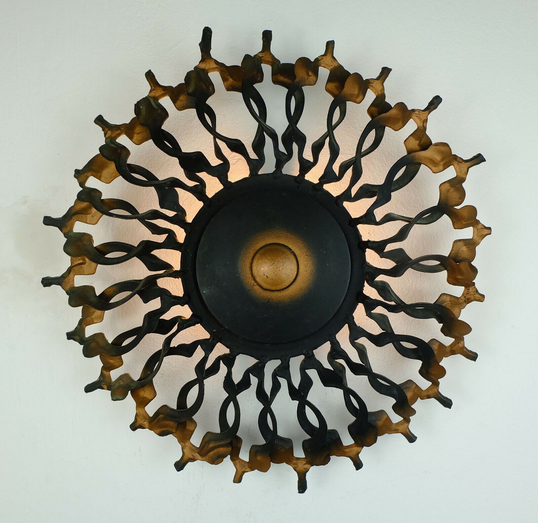 1960s SCONCE mid century sunburst brutalist black iron and copper colored