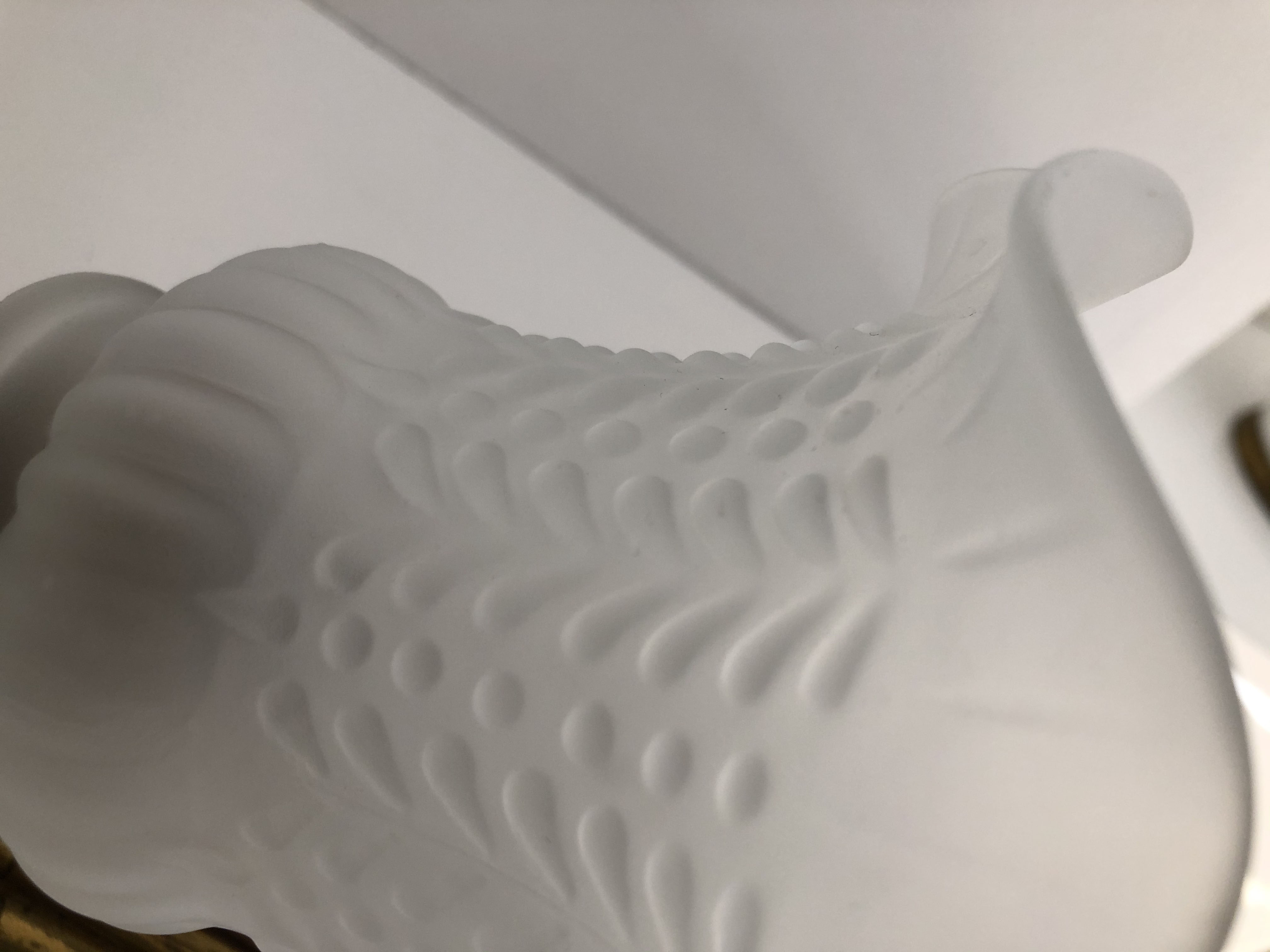 Ancient bronze and opalescent glass sconce