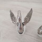 Two frosted glass swan salt cellars with silver plating.