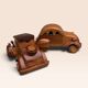 Pair of small handcrafted wooden cars