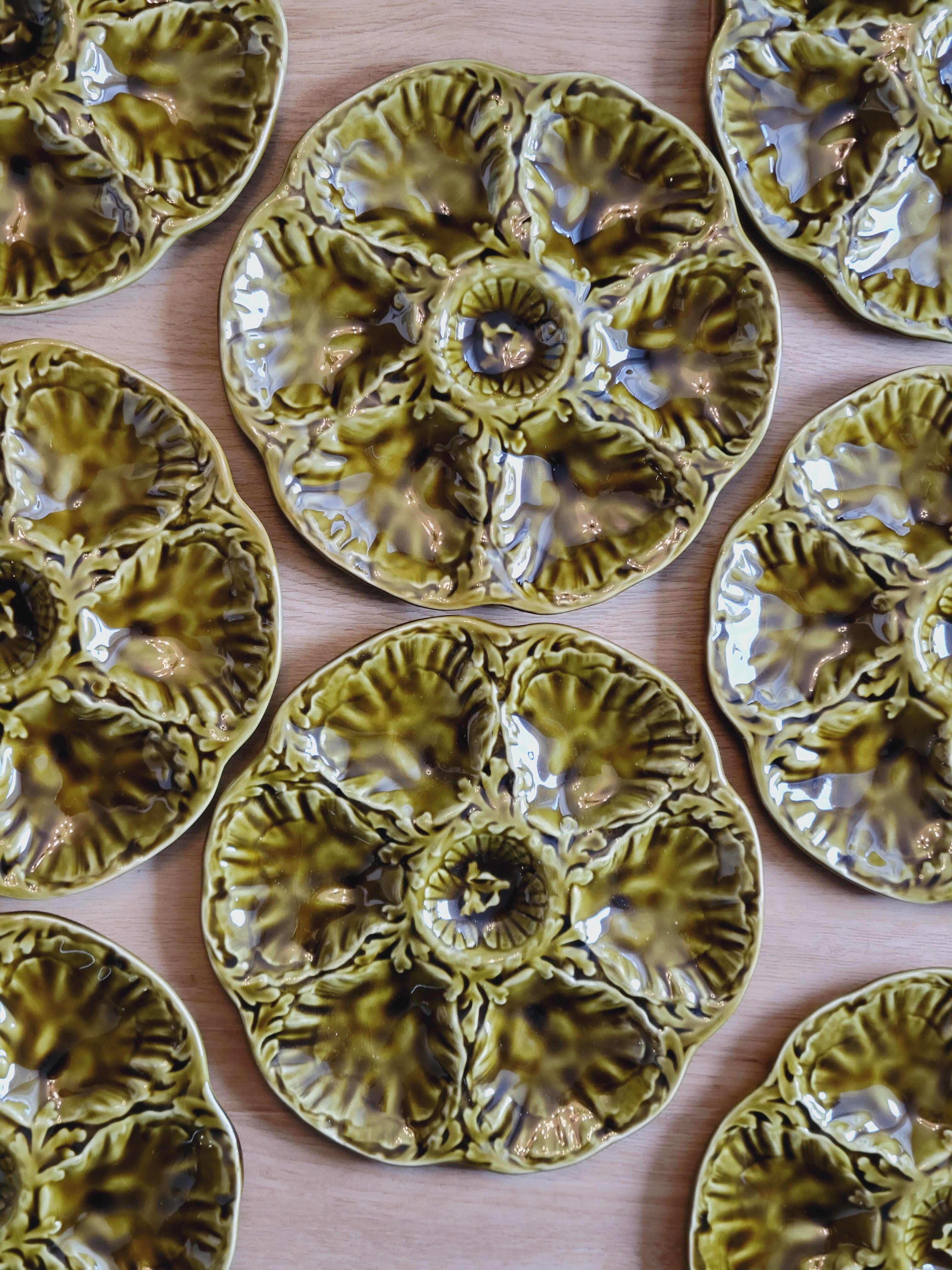 8 oyster plates barbotine Gien green color
