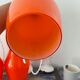 Set of three new electrified orange vintage pendant lamps