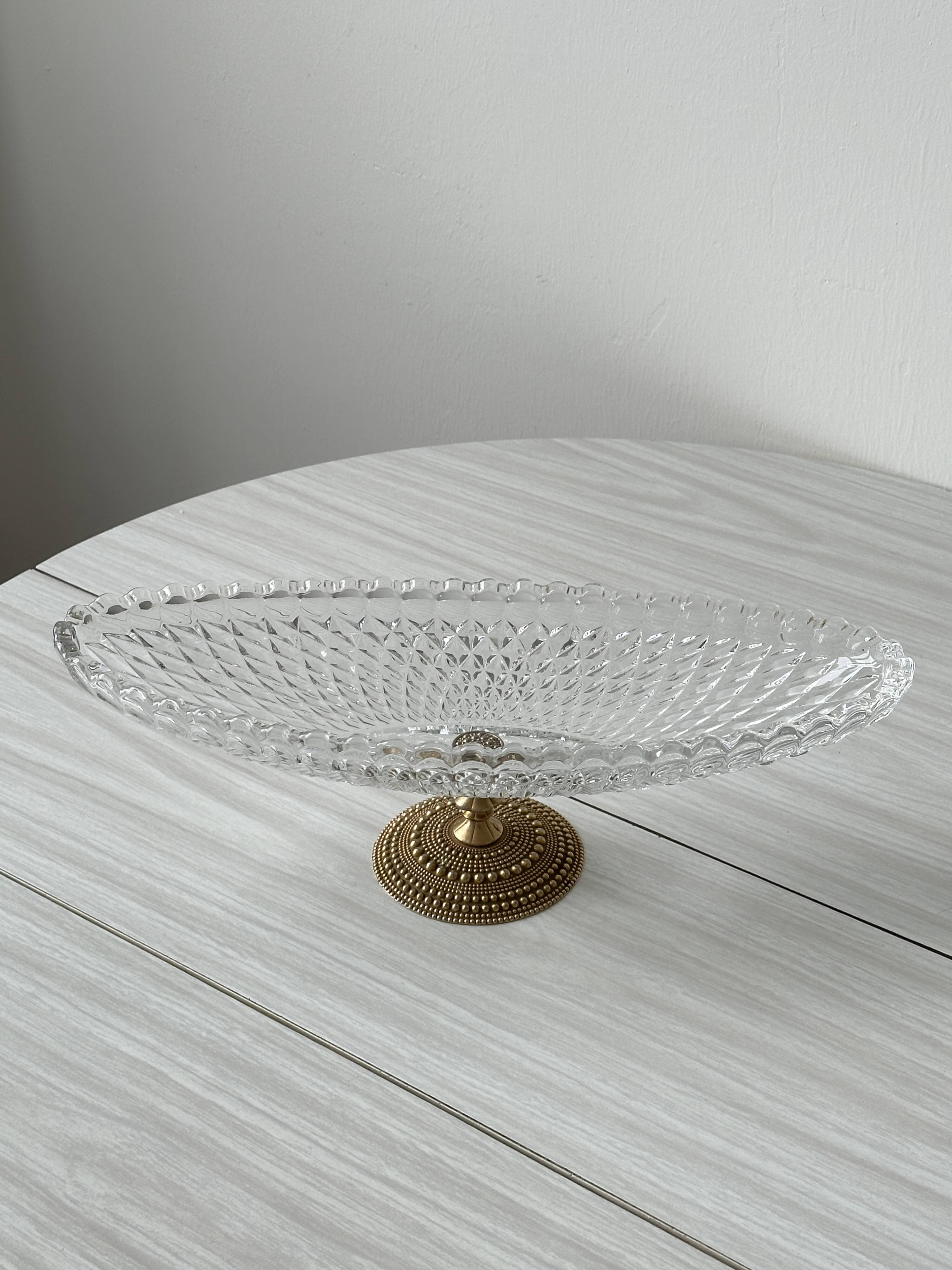 Molded glass bowl with gold metal base