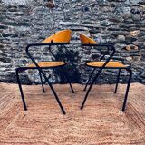 Pair of wooden and black metal chairs