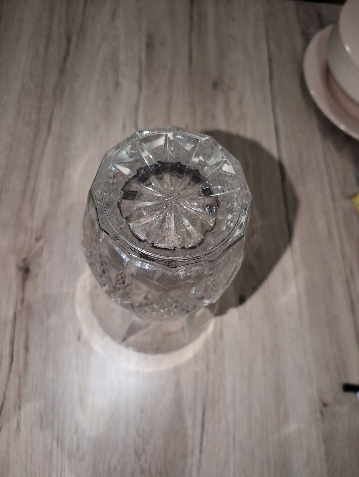 Vintage crystal vase with diamond cut points.