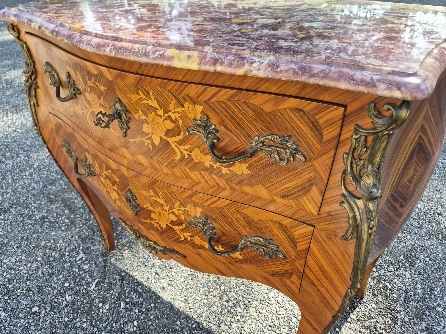 Louis XV style jump commode with marquetry and marble decoration.