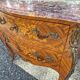 Louis XV style jump commode with marquetry and marble decoration.