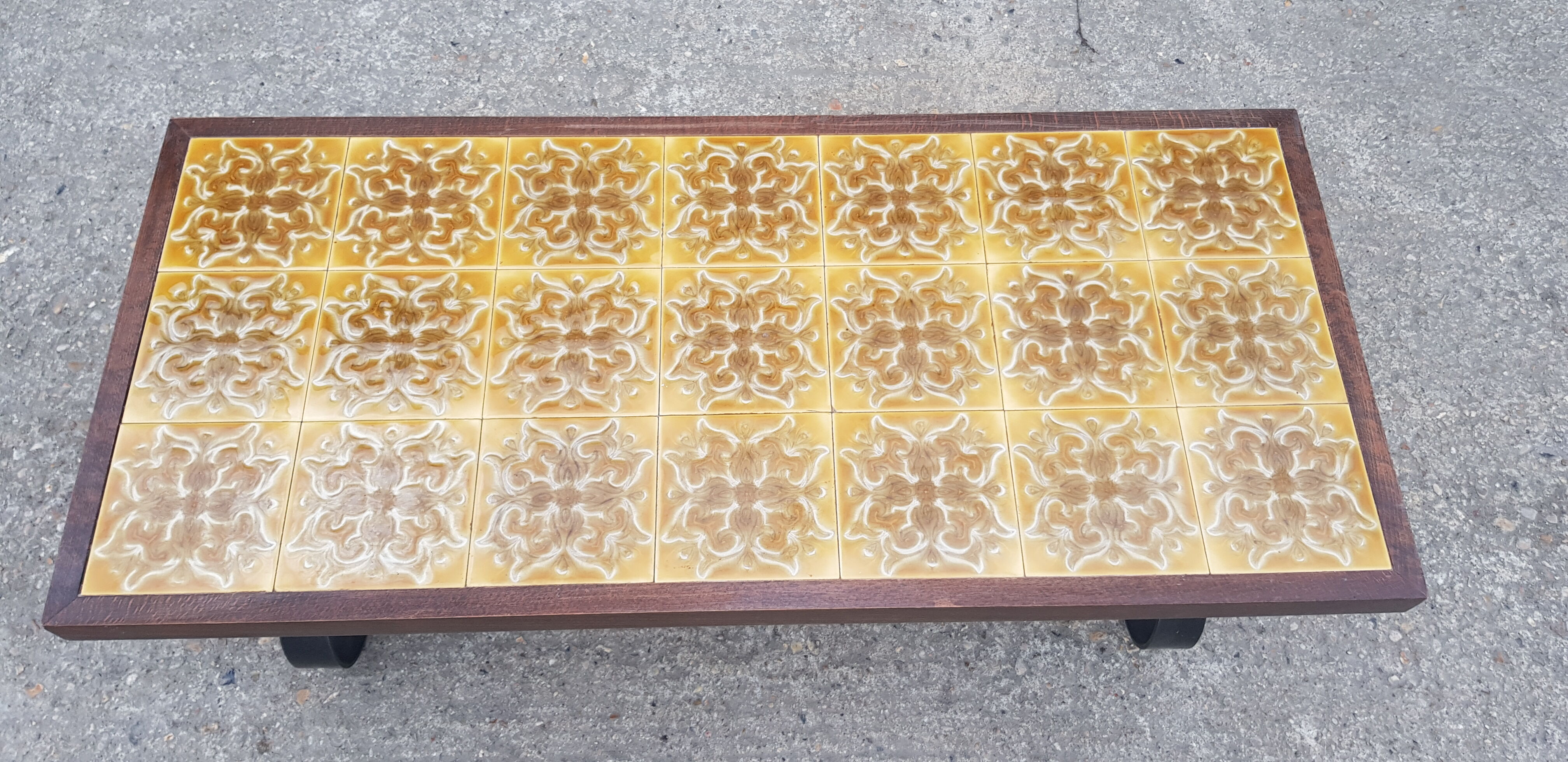 Antique vintage coffee table with glazed earthenware top