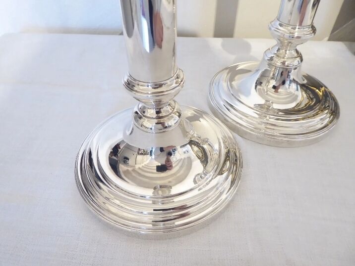 Pair of silver metal candle holders