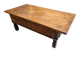 Solid oak coffee table in the style of a maie.