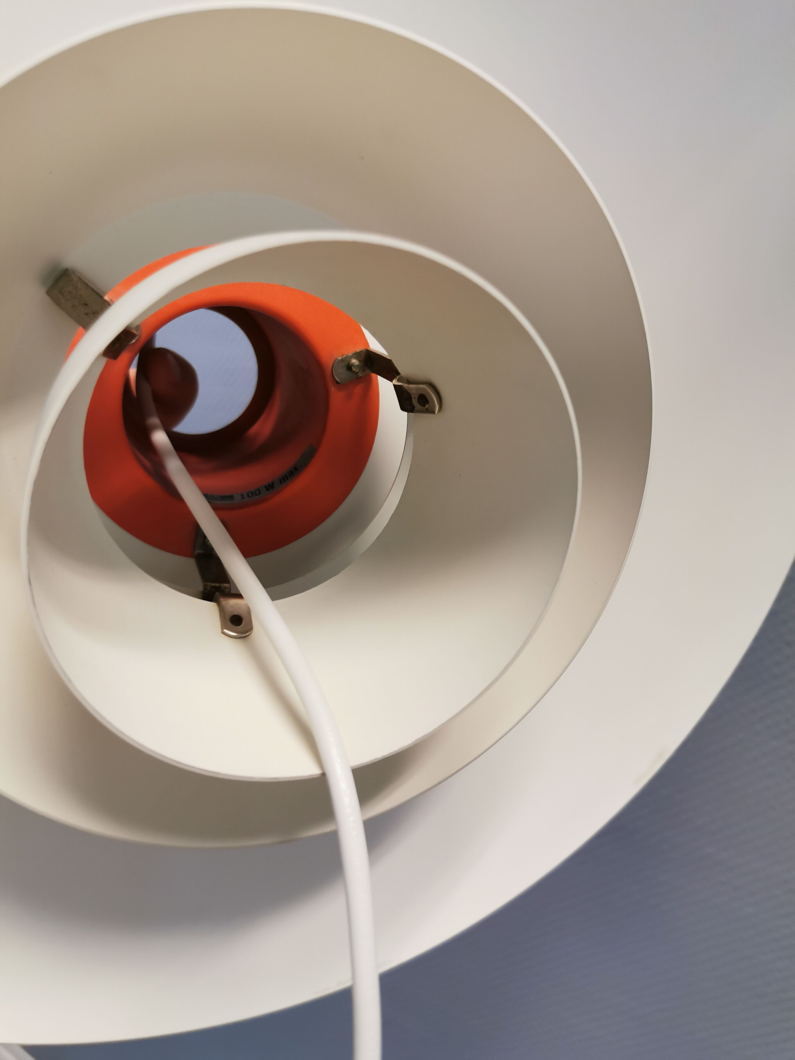 Older ph 4/3 hanging lamp, in white, with original orange suspension disk.