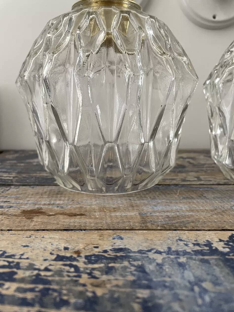 Pair of chiseled glass wall sconces