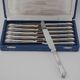 Boulenger Louis XV, 12 silver-plated table knives, excellent condition.