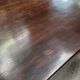 Art Deco dining table with a central cradle base from the 1930s.