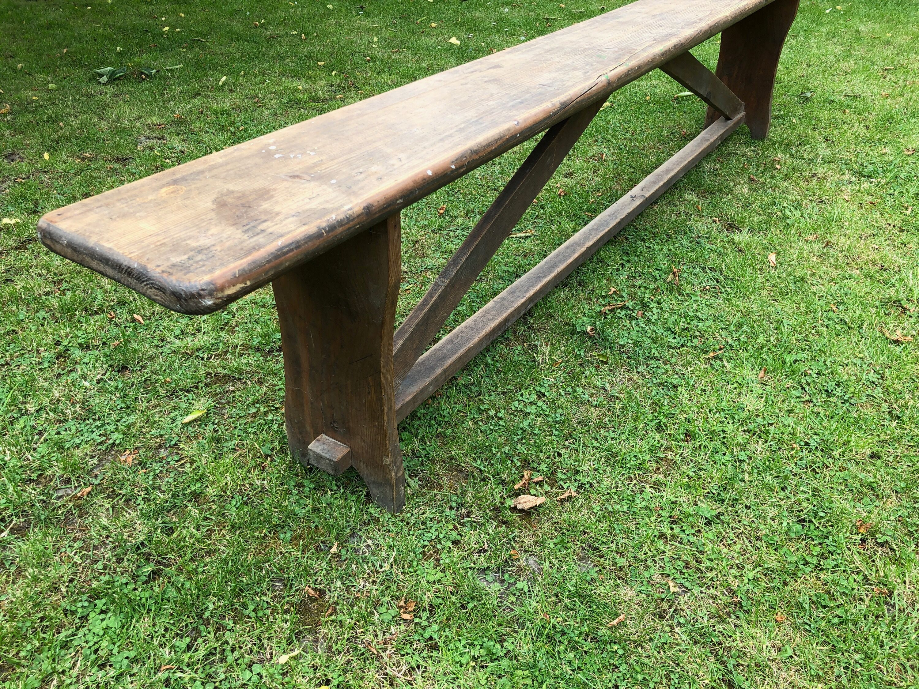 Old solid wood farm bench