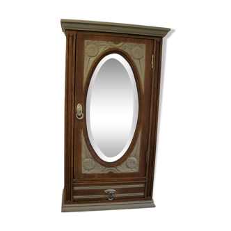 Art Deco wood and linen wall cabinet with mirror