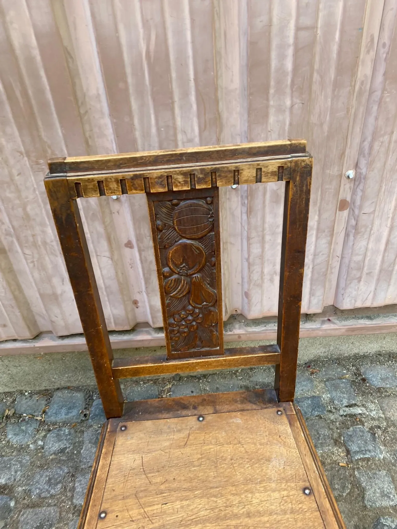 Vintage Art Deco chair in carved oak from the 1930s.