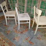 3 white chairs