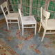 3 white chairs