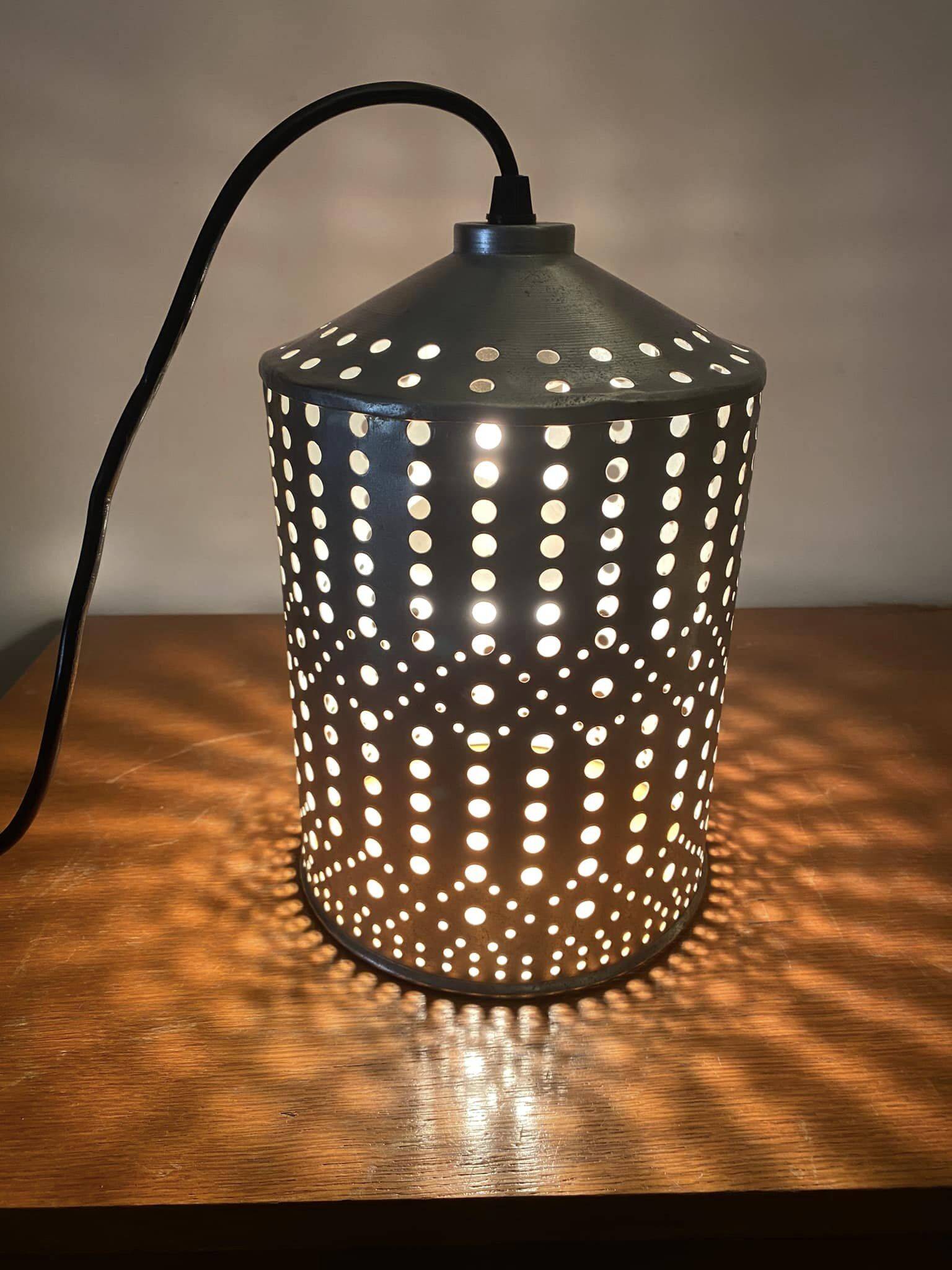 Industrial pendant lamp in perforated gray metal