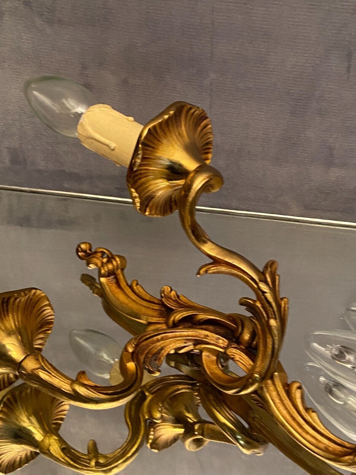 Pair of Louis XV style gilded bronze sconces