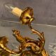 Pair of Louis XV style gilded bronze sconces