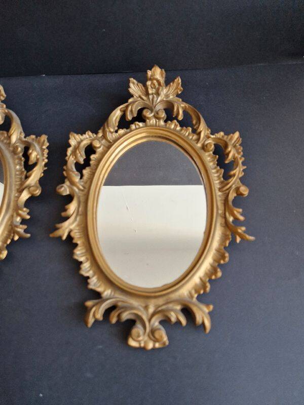Pair of gilded rococo style mirrors, 1970s