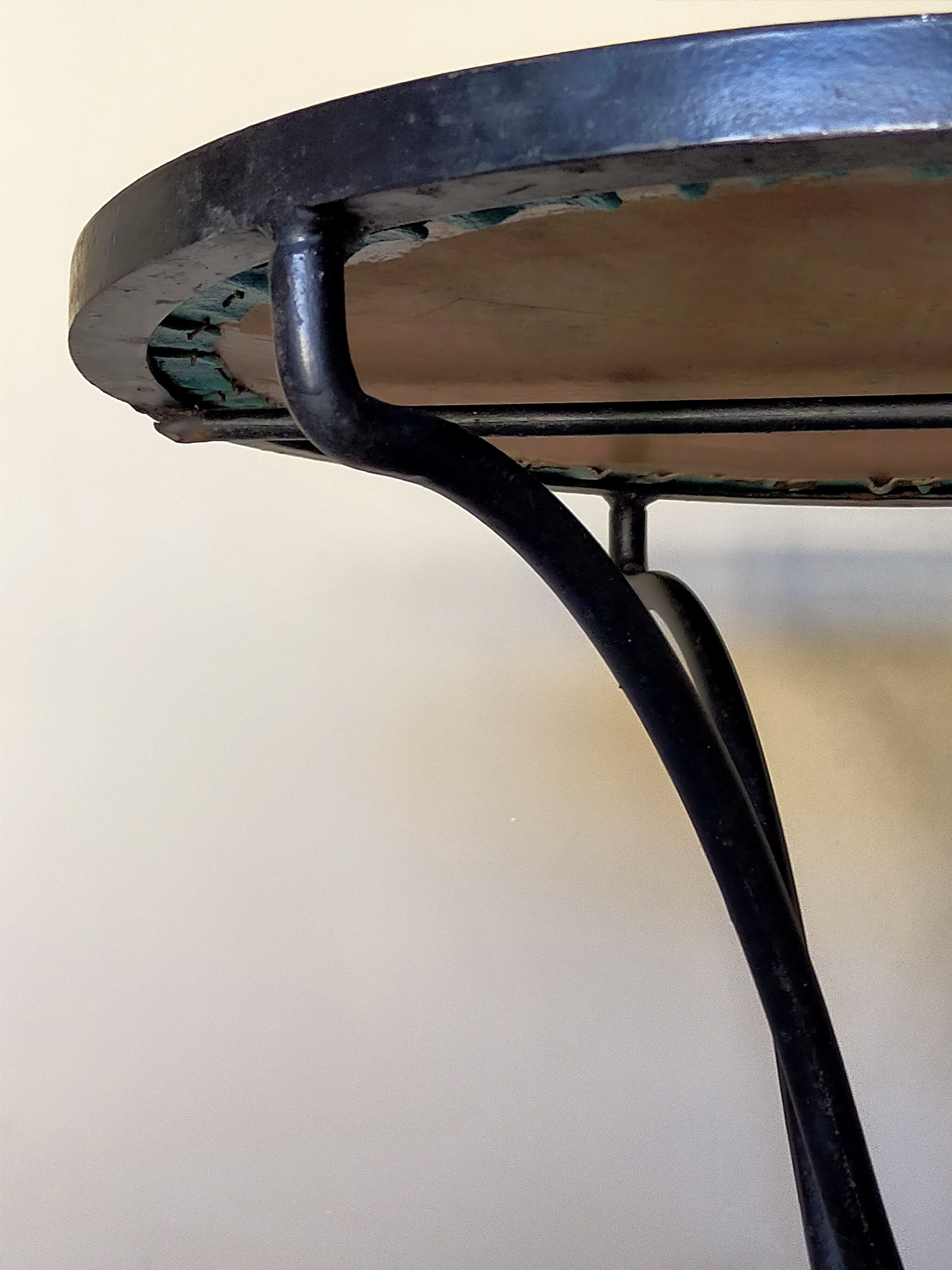 Wrought iron tripod healing in the 1950s