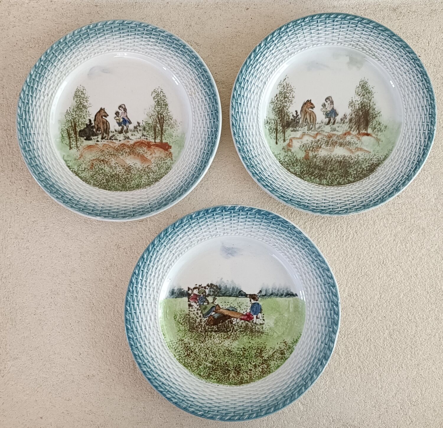 3 plates Saint Amand child scene