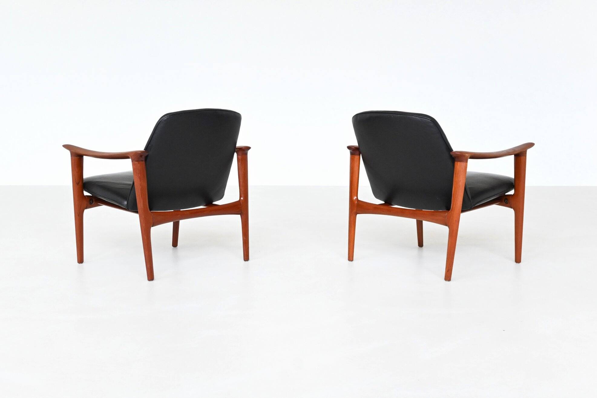 Paire de fauteuils scandinaves en teck et cuir Westnofa Norvège 1960