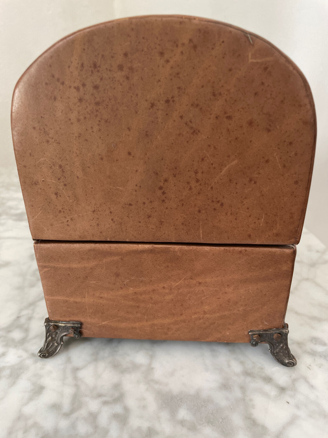 Vintage leather and silver metal jewelry box.