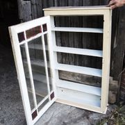 Old workshop wall showcase for screws and bolts