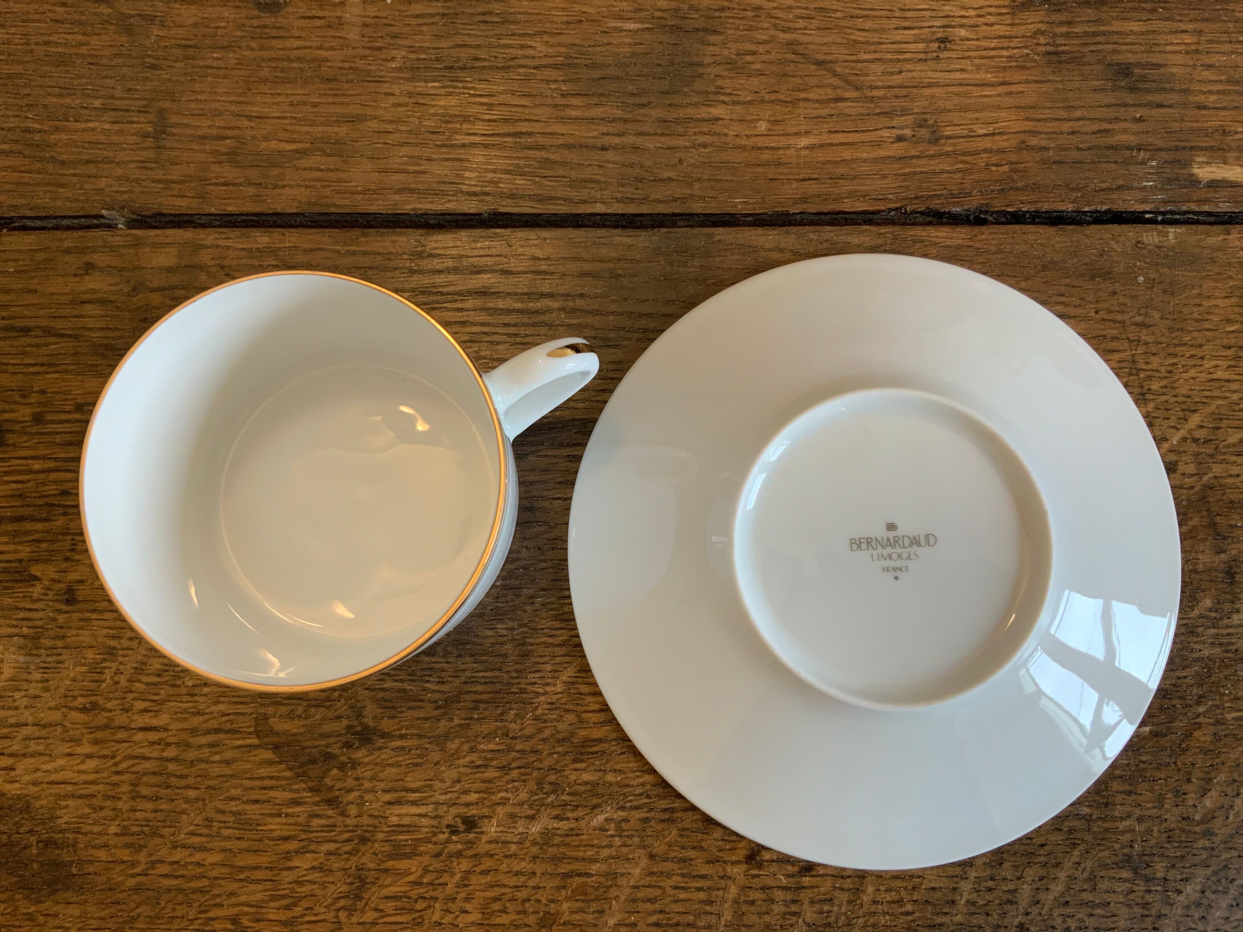 Duo of tea cups gold border Bernardaud Limoges