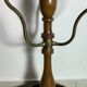 Umbrella stand and English-style wooden and brass canes, 20th century.